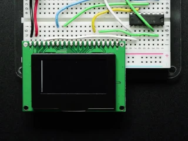 Комплект модуля монохромного графического OLED-дисплея с диагональю 1,54 дюйма и разрешением 128x64 пикселей.